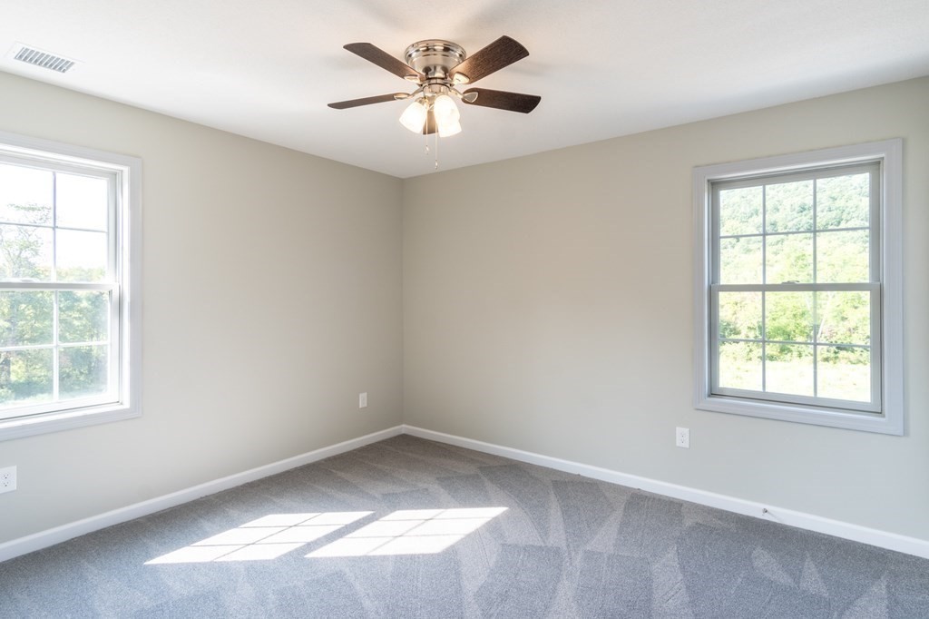 12 Upper Palmer Road Monson, MA 01057 - Photo 24 of 39 an empty room with a window