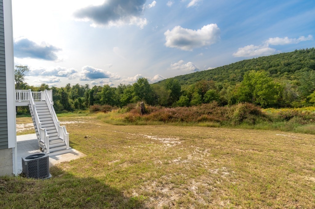 12 Upper Palmer Road Monson, MA 01057 - Photo 31 of 39 a view of a yard with an empty space