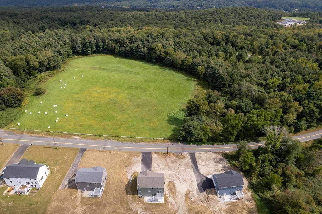 12 Upper Palmer Road Monson, MA 01057 - Photo 34 of 39 an aerial view of a house with a yard