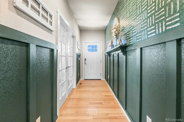 a view of a brick house with a glass door