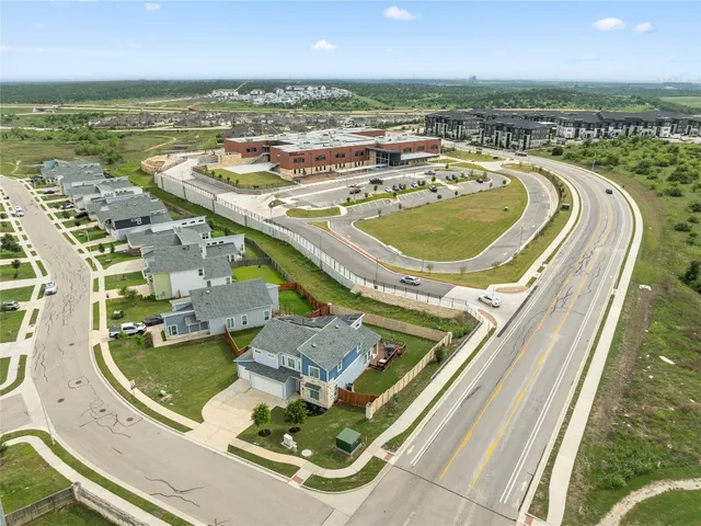 a view of a swimming pool with a terrace
