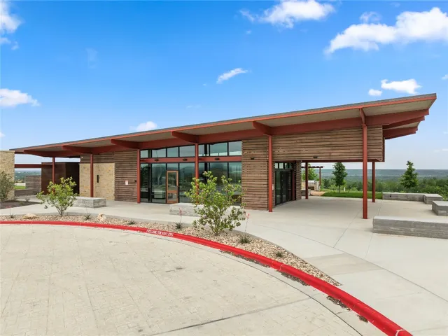 a view of a swimming pool and an ocean view