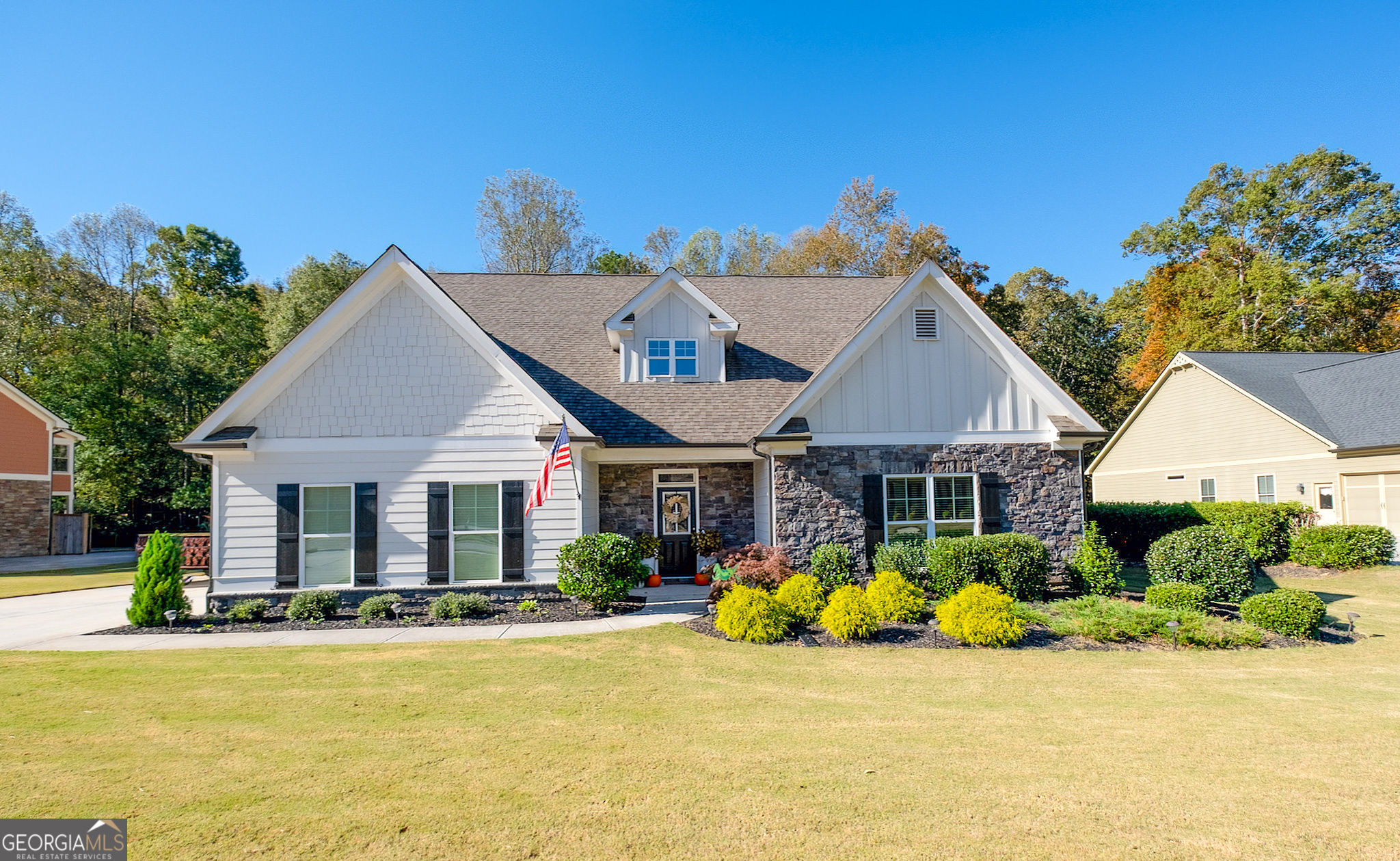 a view of a house with swimming pool and porch