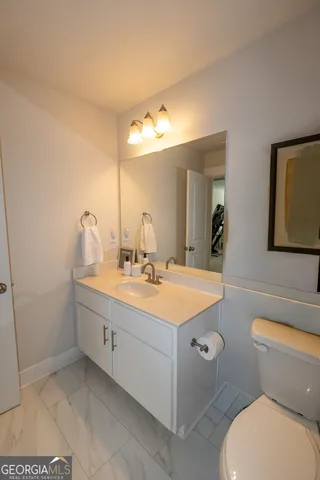 a view of swimming pool with outdoor seating