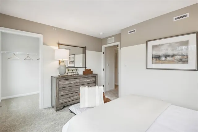 a kitchen with cabinets and window