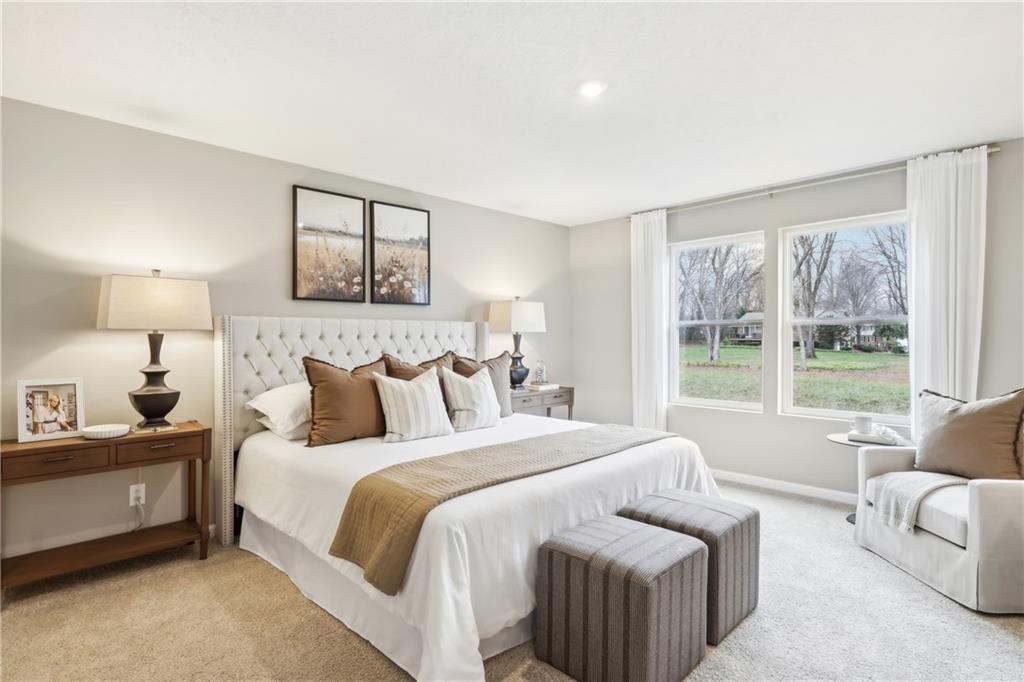 3402 Maple Crest Court Butler, PA 16001 - Photo 26 of 48 a bedroom with a bed and a couch