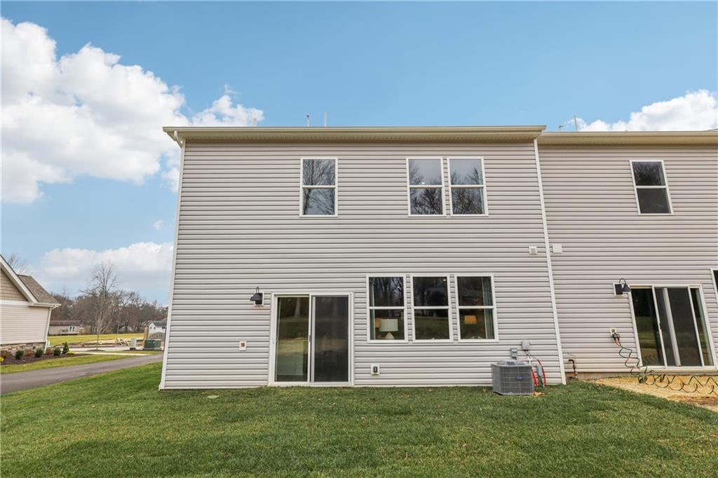 3402 Maple Crest Court Butler, PA 16001 - Photo 35 of 48 a front view of a house with a yard