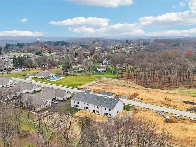 a view of a swimming pool with an ocean view