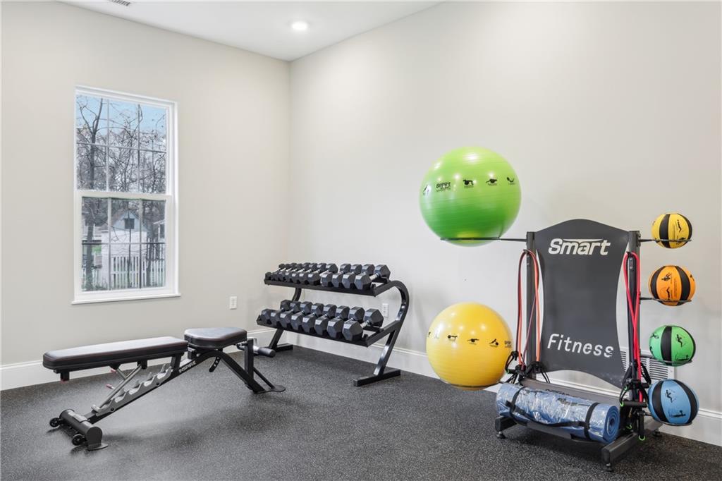 3402 Maple Crest Court Butler, PA 16001 - Photo 44 of 48 a living room with a table and chairs