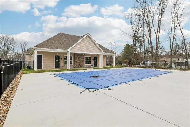 a house with trees in front of it
