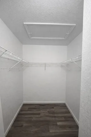 a view of an empty walk in closet