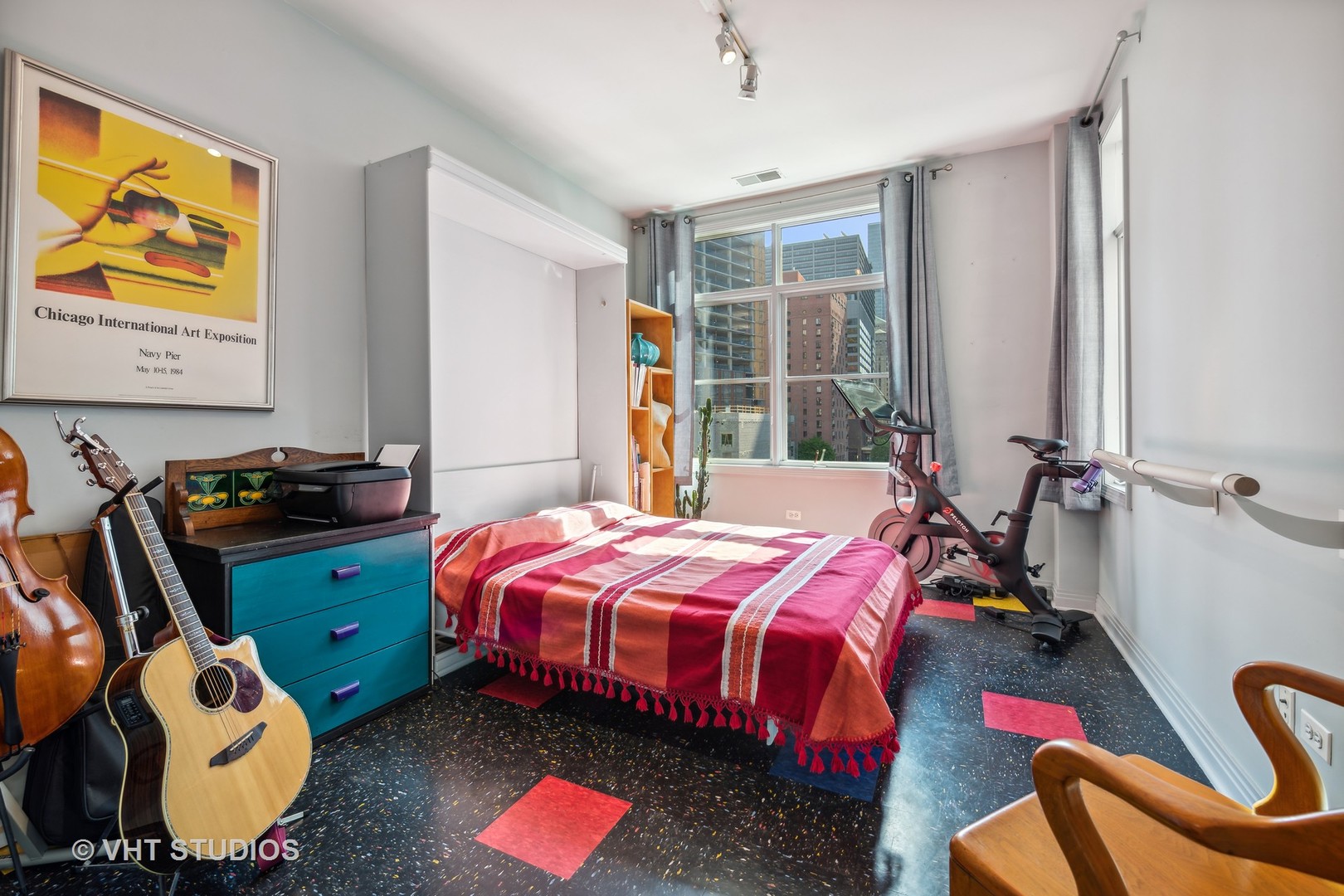 330 North Clinton Street, Unit 504 Chicago, IL 60661 - Photo 20 of 25 a bedroom with bed and a large window