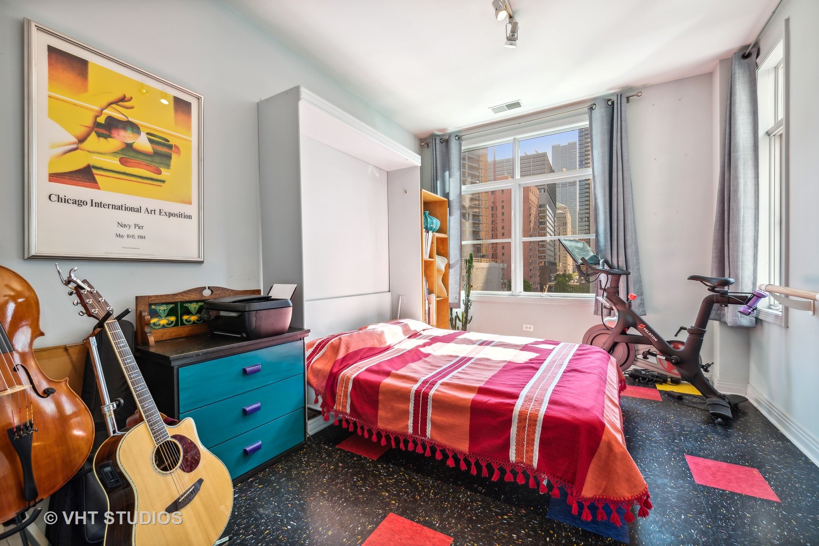 330 North Clinton Street, Unit 504 Chicago, IL 60661 - Photo 21 of 25 a bedroom with a bed and a window