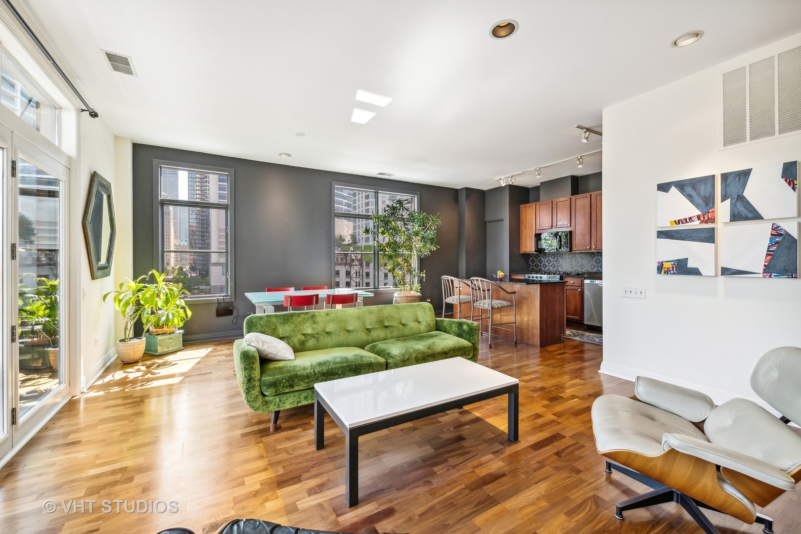 330 North Clinton Street, Unit 504 Chicago, IL 60661 - Photo 9 of 25 a living room with furniture and a floor to ceiling window