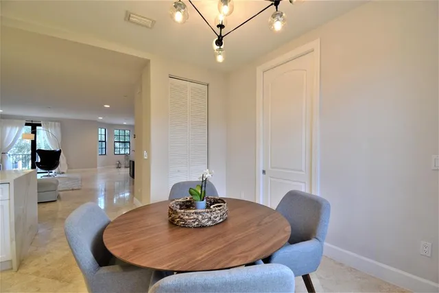 a bedroom with a bed window and a desk