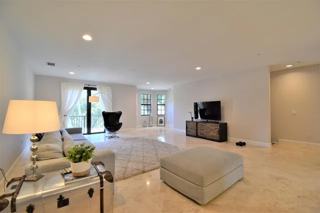 a bathroom with a sink a mirror and a toilet