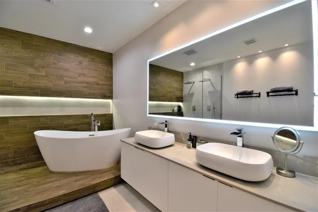 an aerial view of residential house with outdoor space and swimming pool