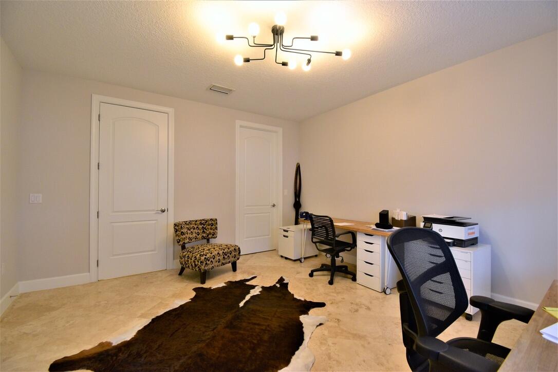 4866 Northwest 16th Avenue Boca Raton, FL 33431 - Photo 8 of 68 a room with gym equipment