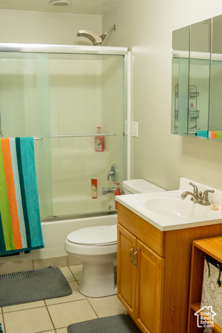 2269 Clear Creek Road Nibley, UT 84321 - Photo 27 of 27 Bathroom featuring vanity, tile patterned flooring, and combined bath / shower with glass door