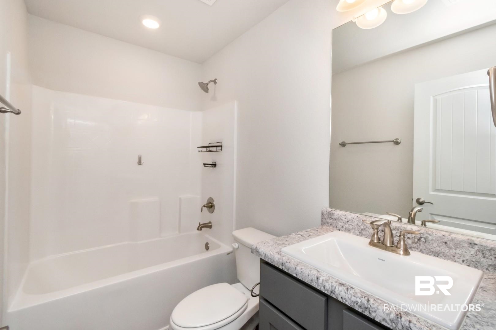 6632 Monarch Circle Mobile, AL 36618 - Photo 24 of 32 Full bathroom featuring vanity and tub / shower combination