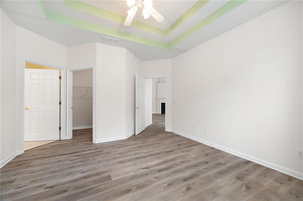 3832 Abbott Lane, Unit 1 Powder Springs, GA 30127 - Photo 26 of 37 a view of an empty room with wooden floor
