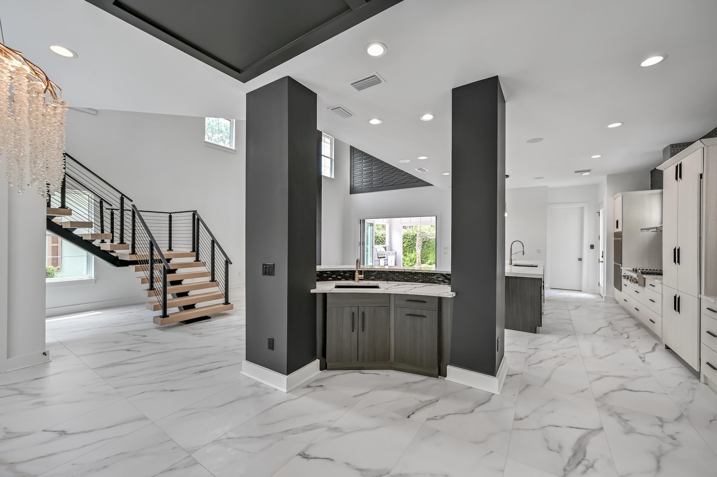 80 Rue Martine Miramar Beach, FL 32550 - Photo 17 of 54 a view of entryway with livingroom and stairs