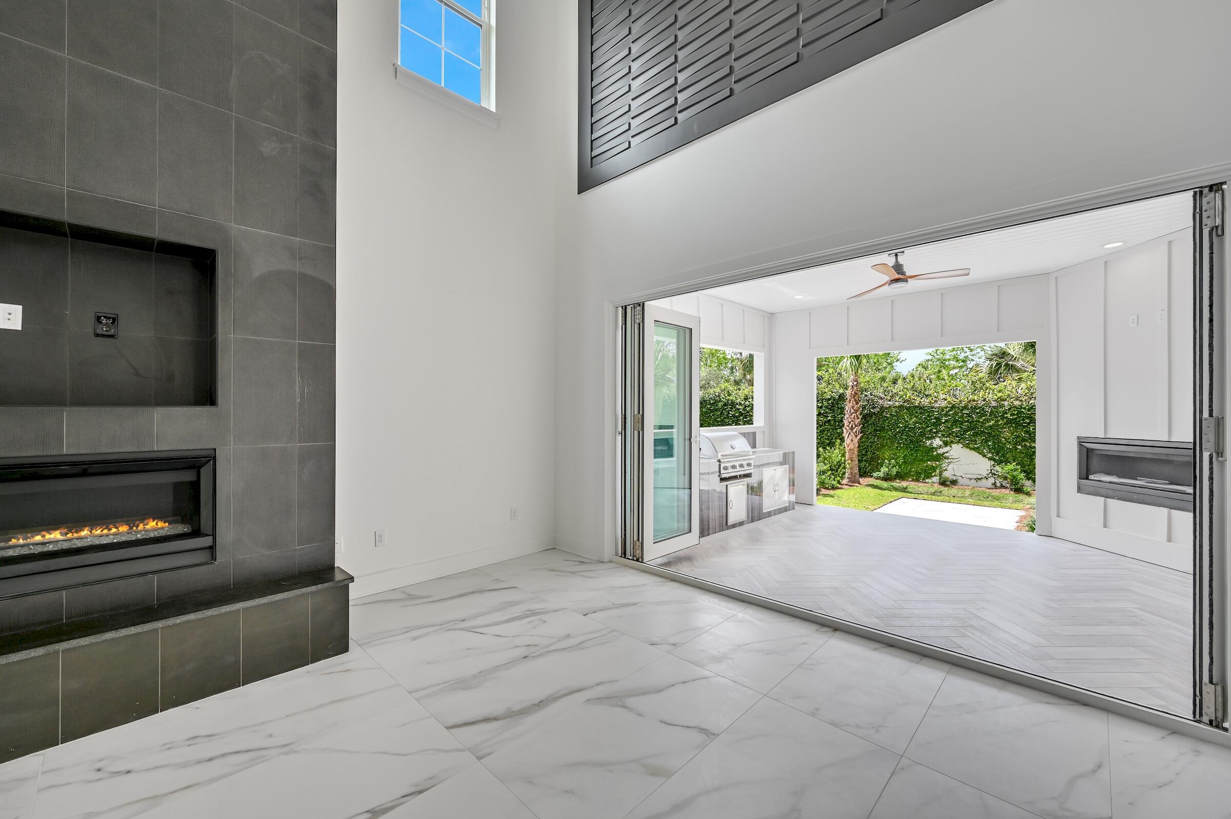 80 Rue Martine Miramar Beach, FL 32550 - Photo 24 of 54 a view of a hallway with a fireplace and a window