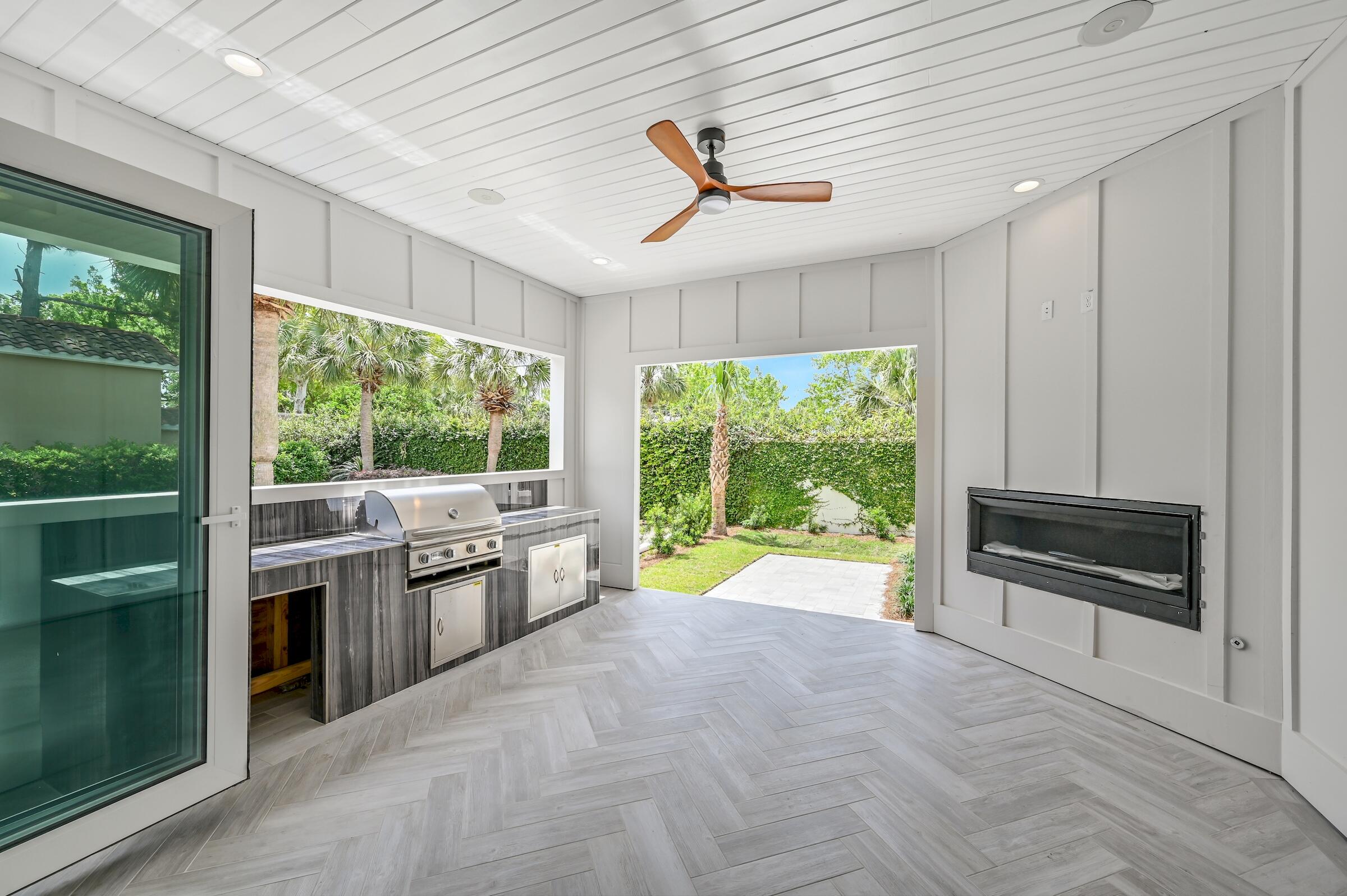 80 Rue Martine Miramar Beach, FL 32550 - Photo 25 of 54 a view of a kitchen with kitchen island a large window