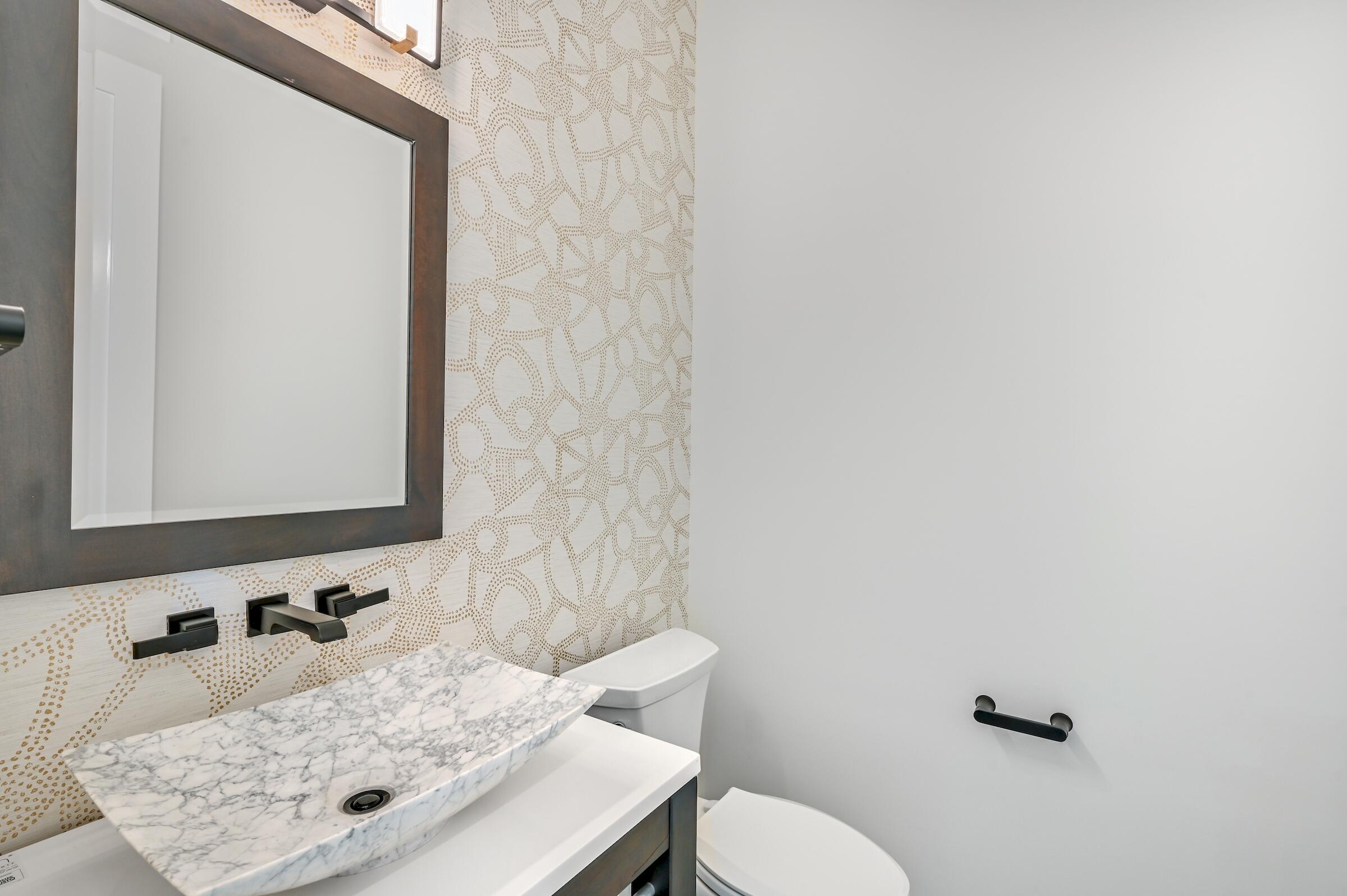 80 Rue Martine Miramar Beach, FL 32550 - Photo 29 of 54 a bathroom with a sink and a mirror