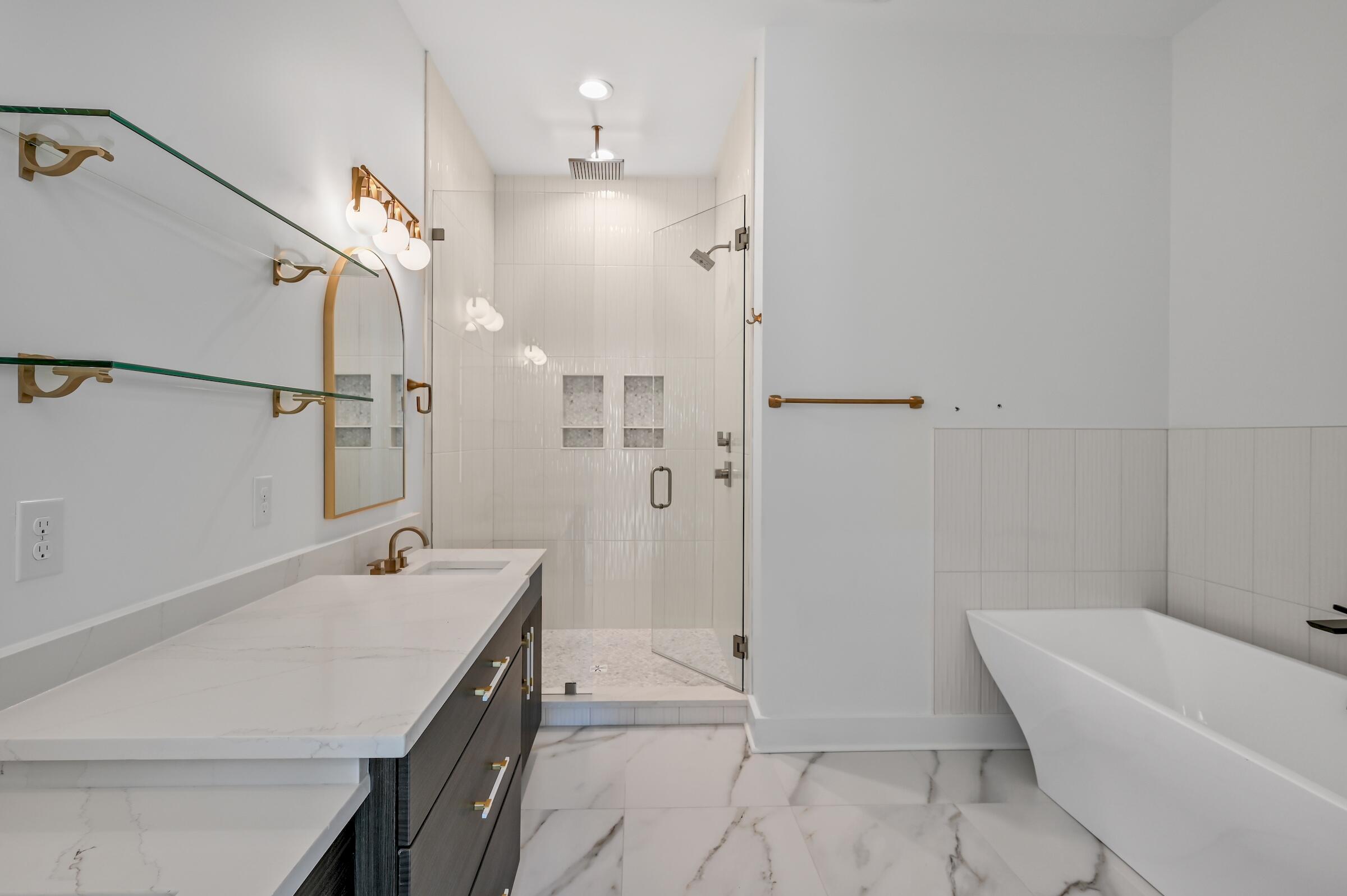 80 Rue Martine Miramar Beach, FL 32550 - Photo 31 of 54 a bathroom with a tub sink shower and a mirror