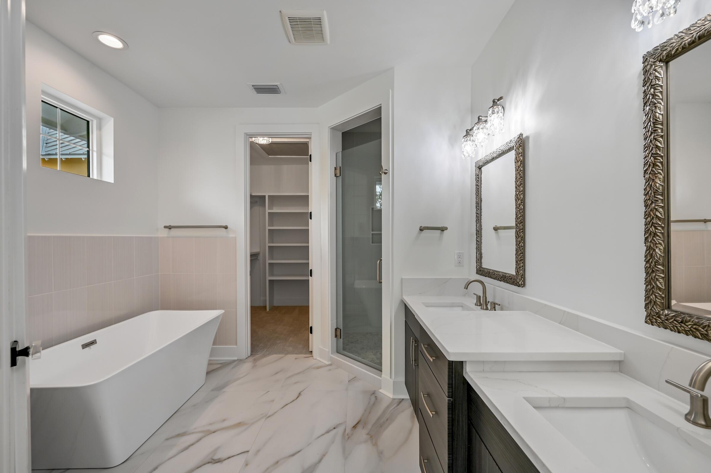 80 Rue Martine Miramar Beach, FL 32550 - Photo 41 of 54 a bathroom with a sink a toilet and shower