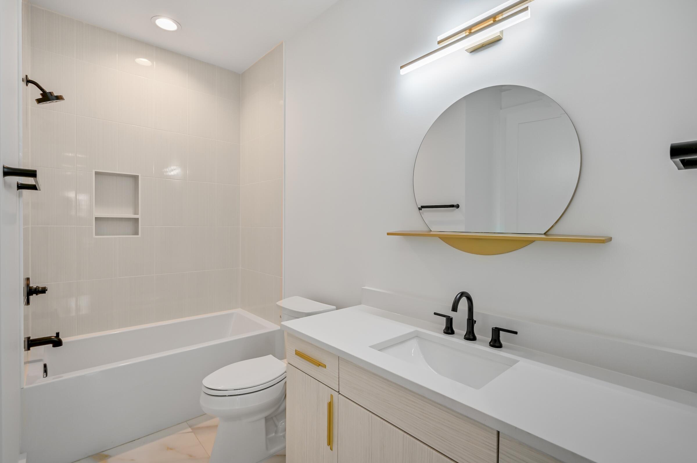 80 Rue Martine Miramar Beach, FL 32550 - Photo 44 of 54 a bathroom with a sink a toilet and a mirror