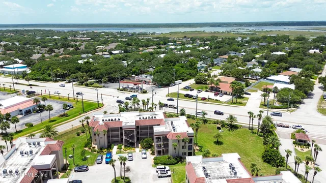 an aerial view of a city with lots of residential buildings
