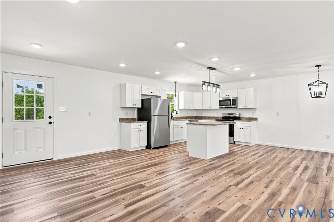 104 Abrams Road Farmville, VA 23901 - Photo 10 of 25 Spacious open-concept kitchen and dining area feat