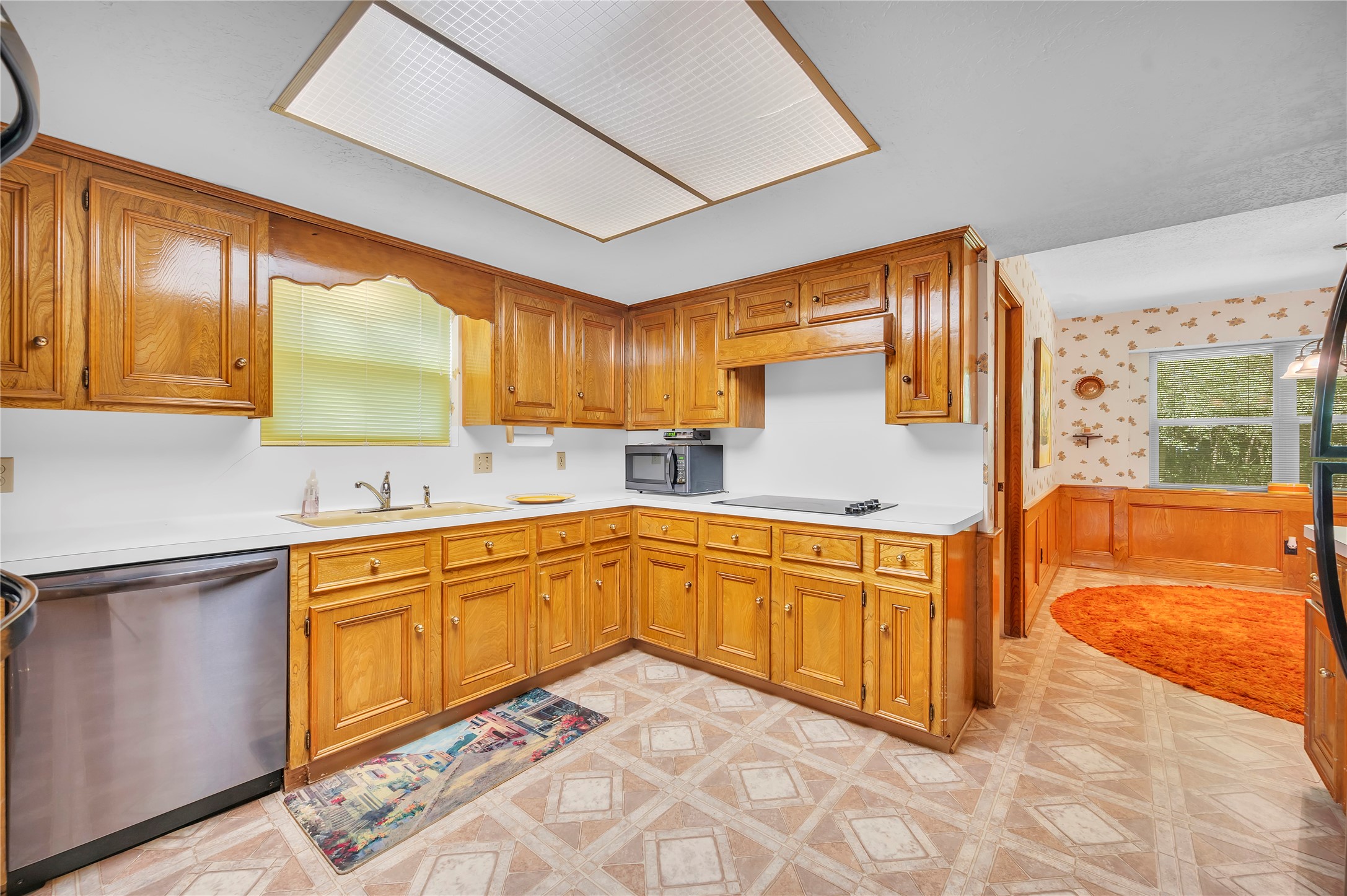 17903 Fireside Drive Spring, TX 77379 - Photo 13 of 33 a kitchen with stainless steel appliances granite countertop sink stove and cabinets