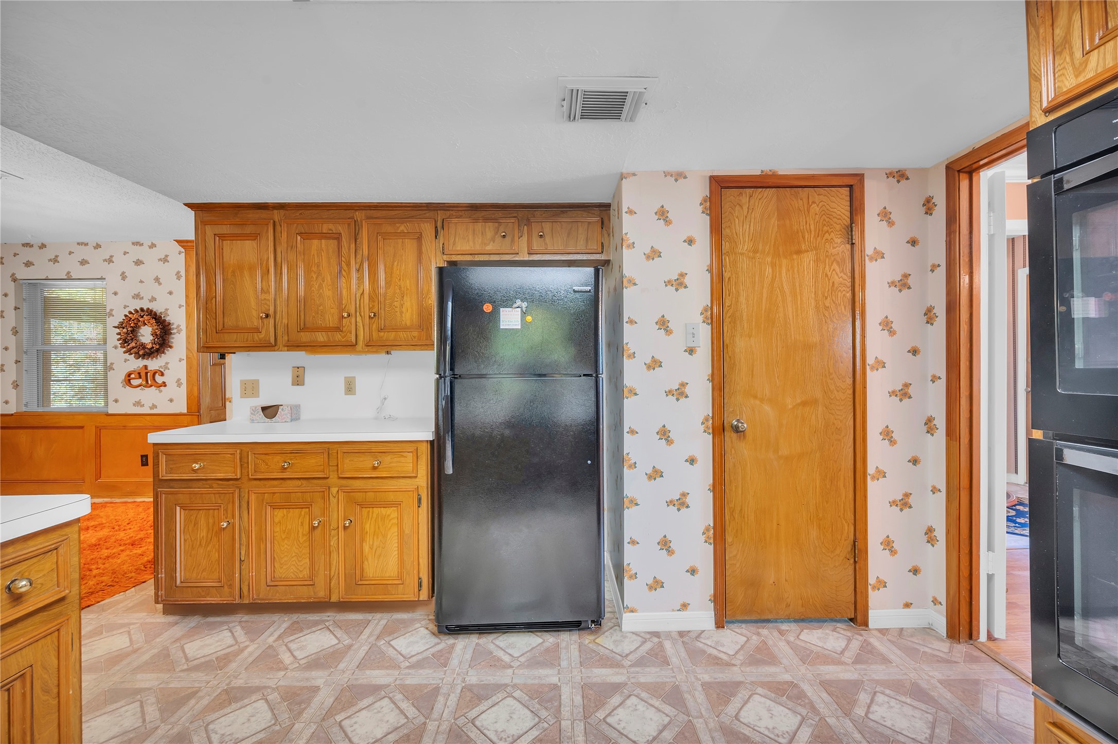 17903 Fireside Drive Spring, TX 77379 - Photo 15 of 33 a kitchen with stainless steel appliances a refrigerator and a stove