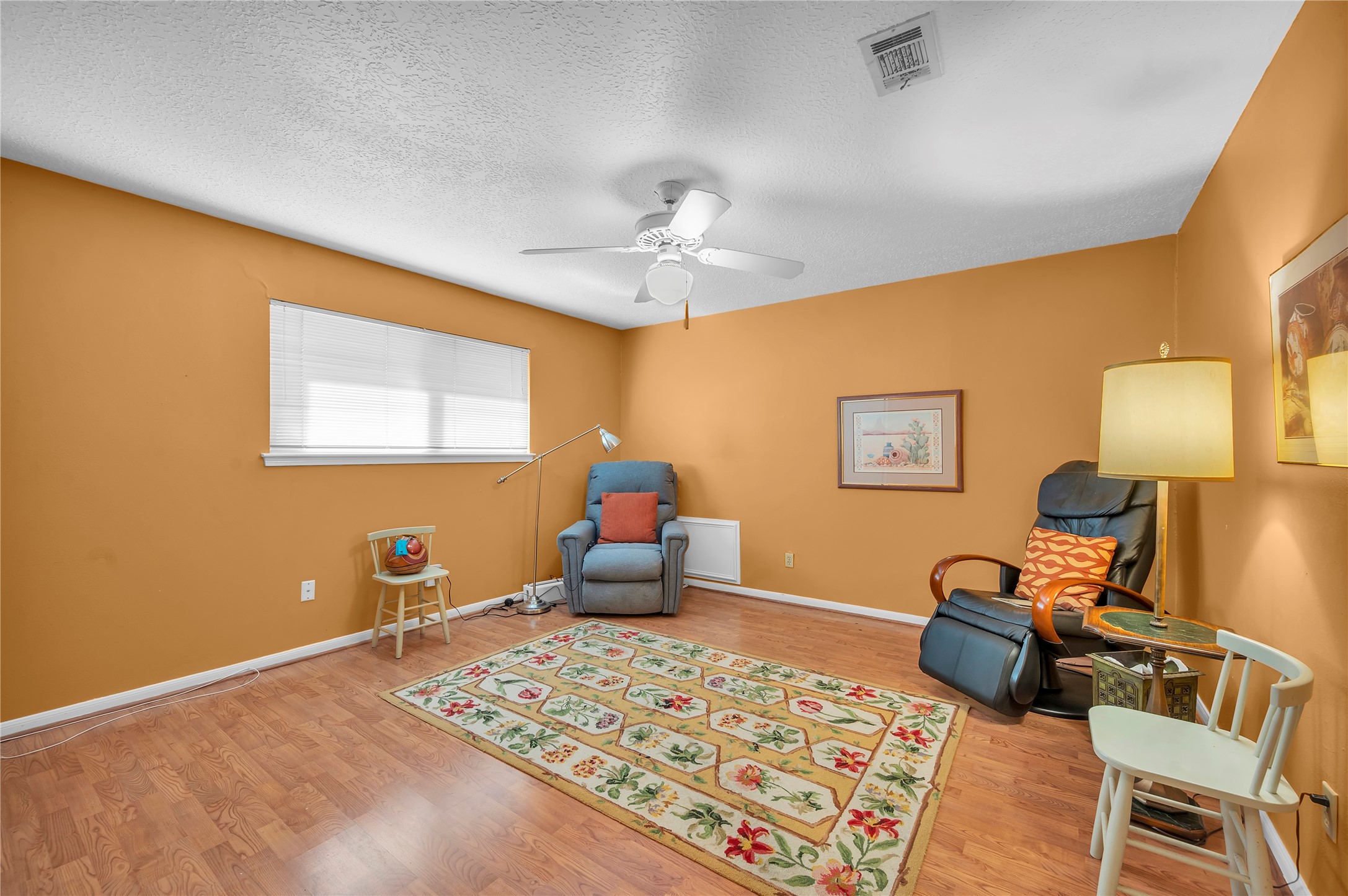 17903 Fireside Drive Spring, TX 77379 - Photo 21 of 33 a bedroom with bed and wooden floor