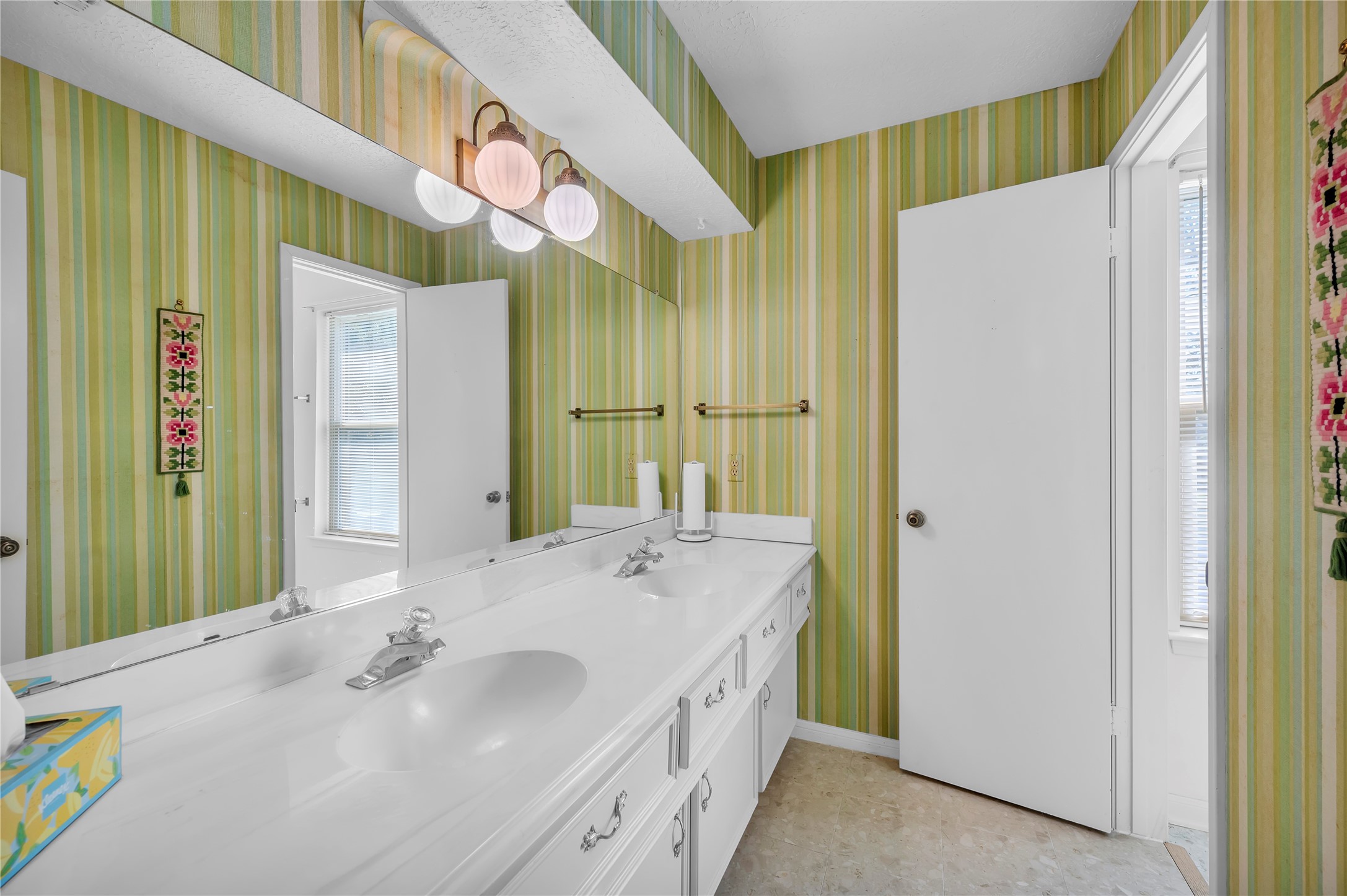 17903 Fireside Drive Spring, TX 77379 - Photo 22 of 33 a bathroom with a sink a mirror and a shower