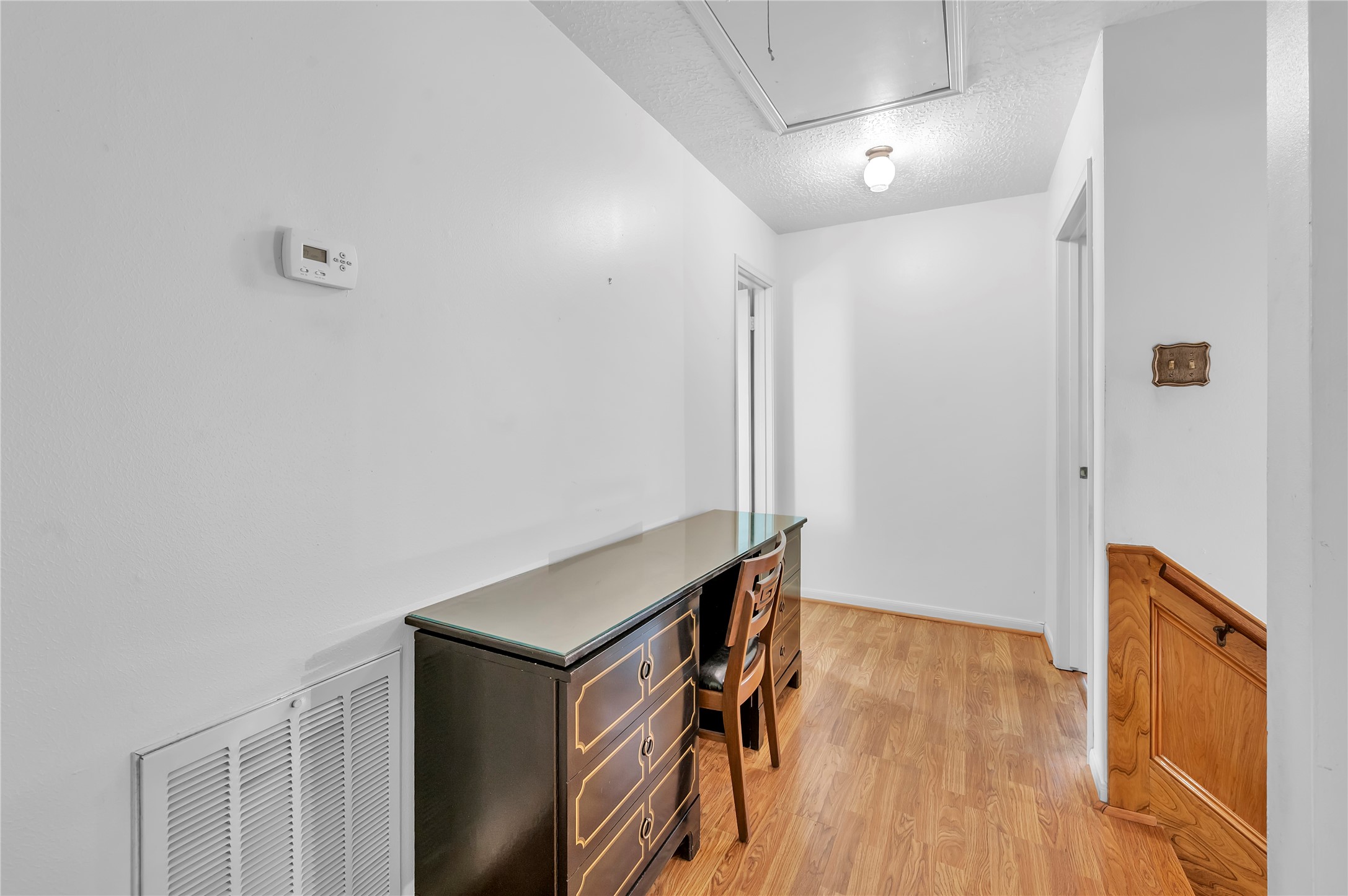 17903 Fireside Drive Spring, TX 77379 - Photo 28 of 33 a view of a hallway with wooden floor