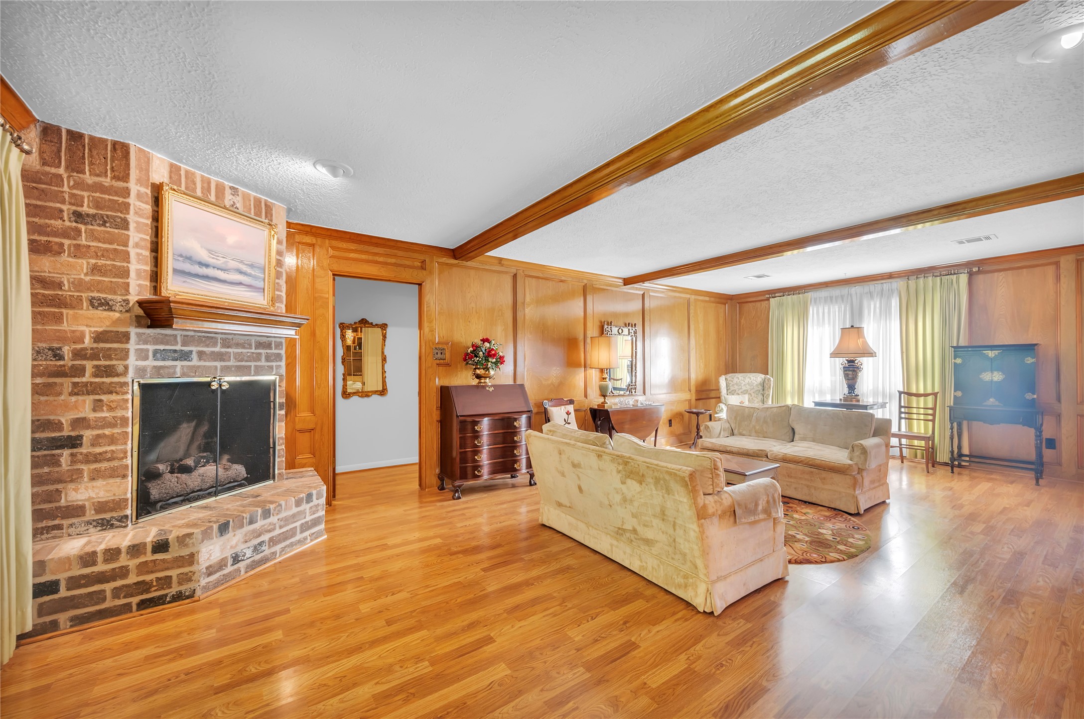 17903 Fireside Drive Spring, TX 77379 - Photo 10 of 33 a living room with furniture large window and a fireplace