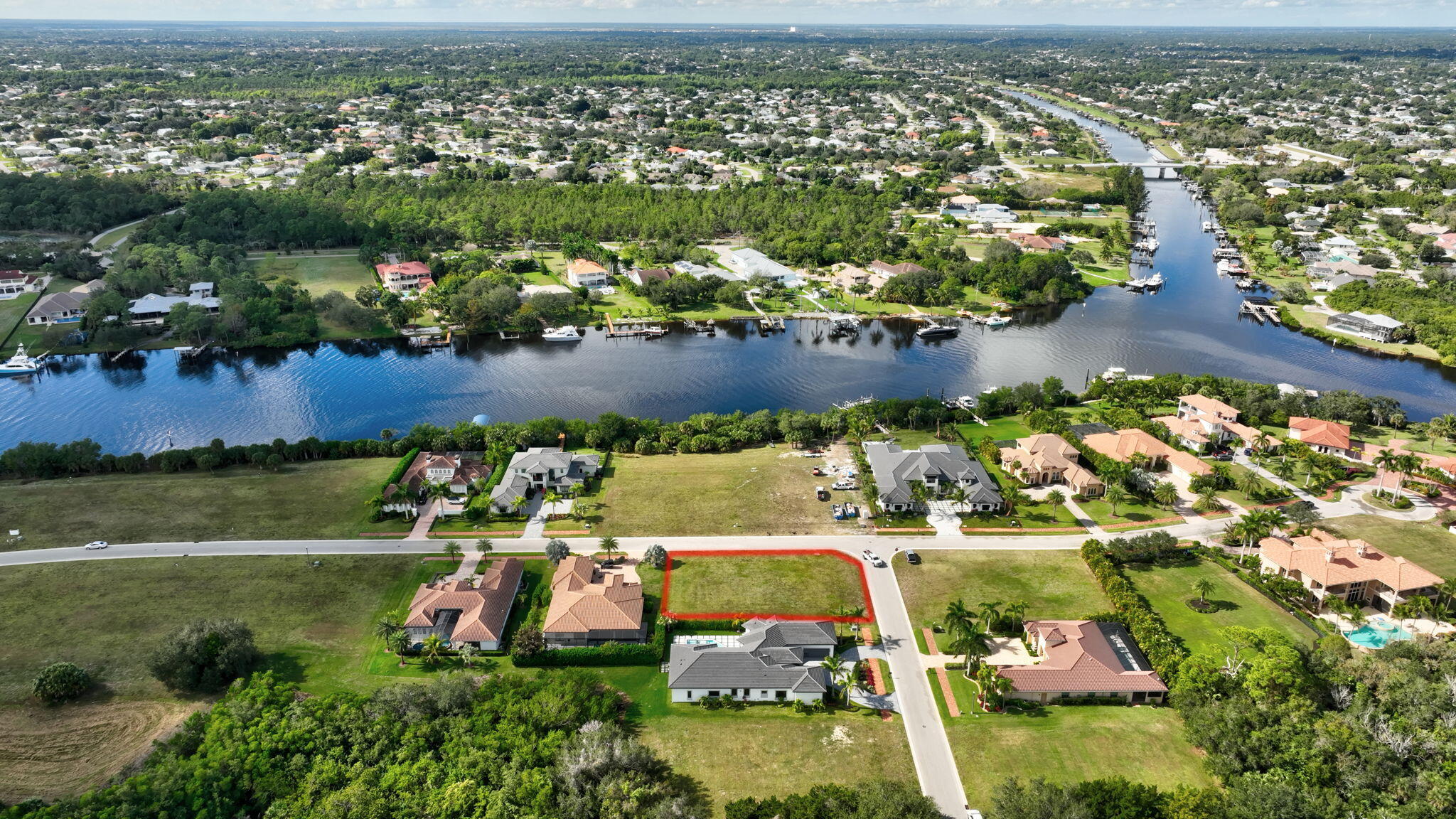 183 Southeast Via Terra Bella Port St. Lucie, FL 34952 - Photo 12 of 26 an aerial view of a houses with a lake view