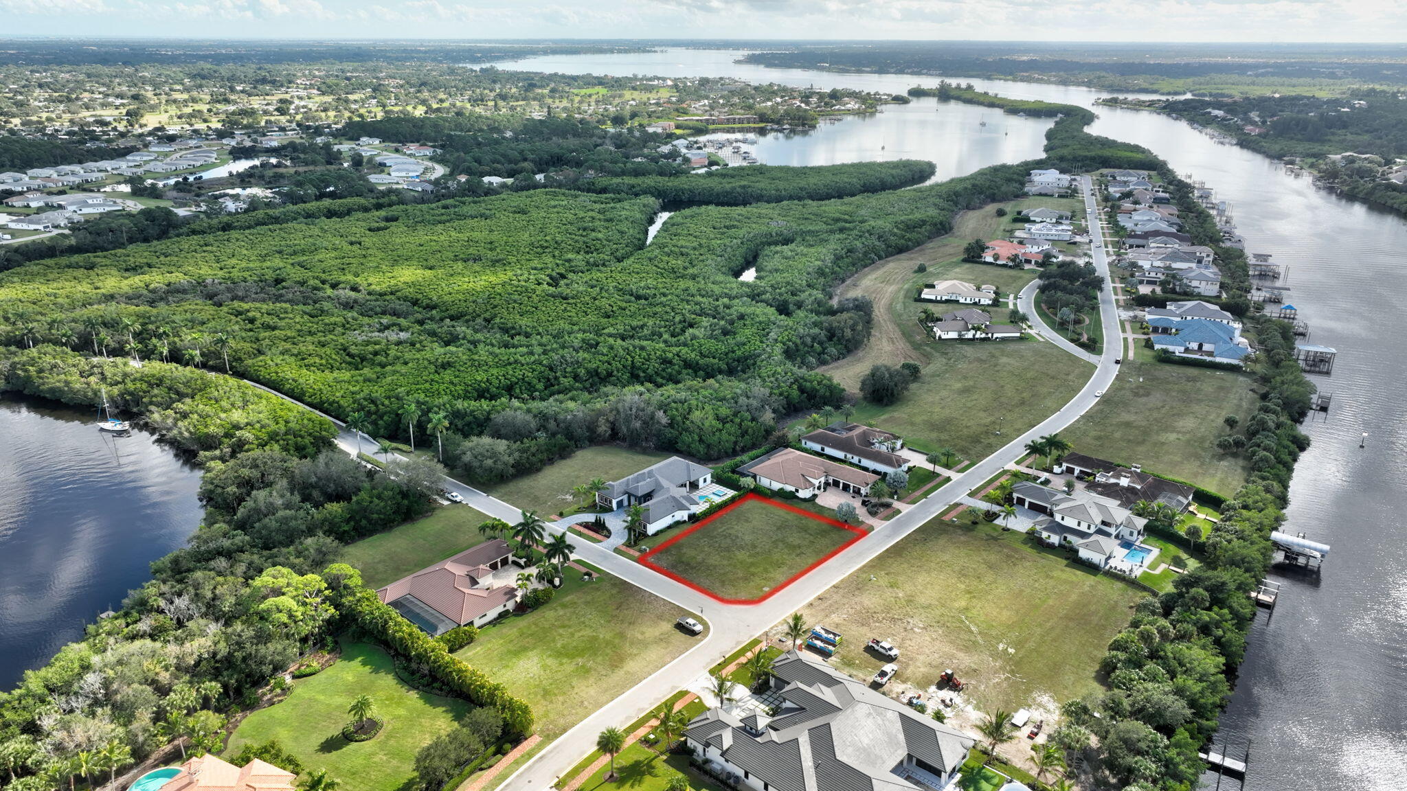 183 Southeast Via Terra Bella Port St. Lucie, FL 34952 - Photo 18 of 26 an aerial view of a house with a garden