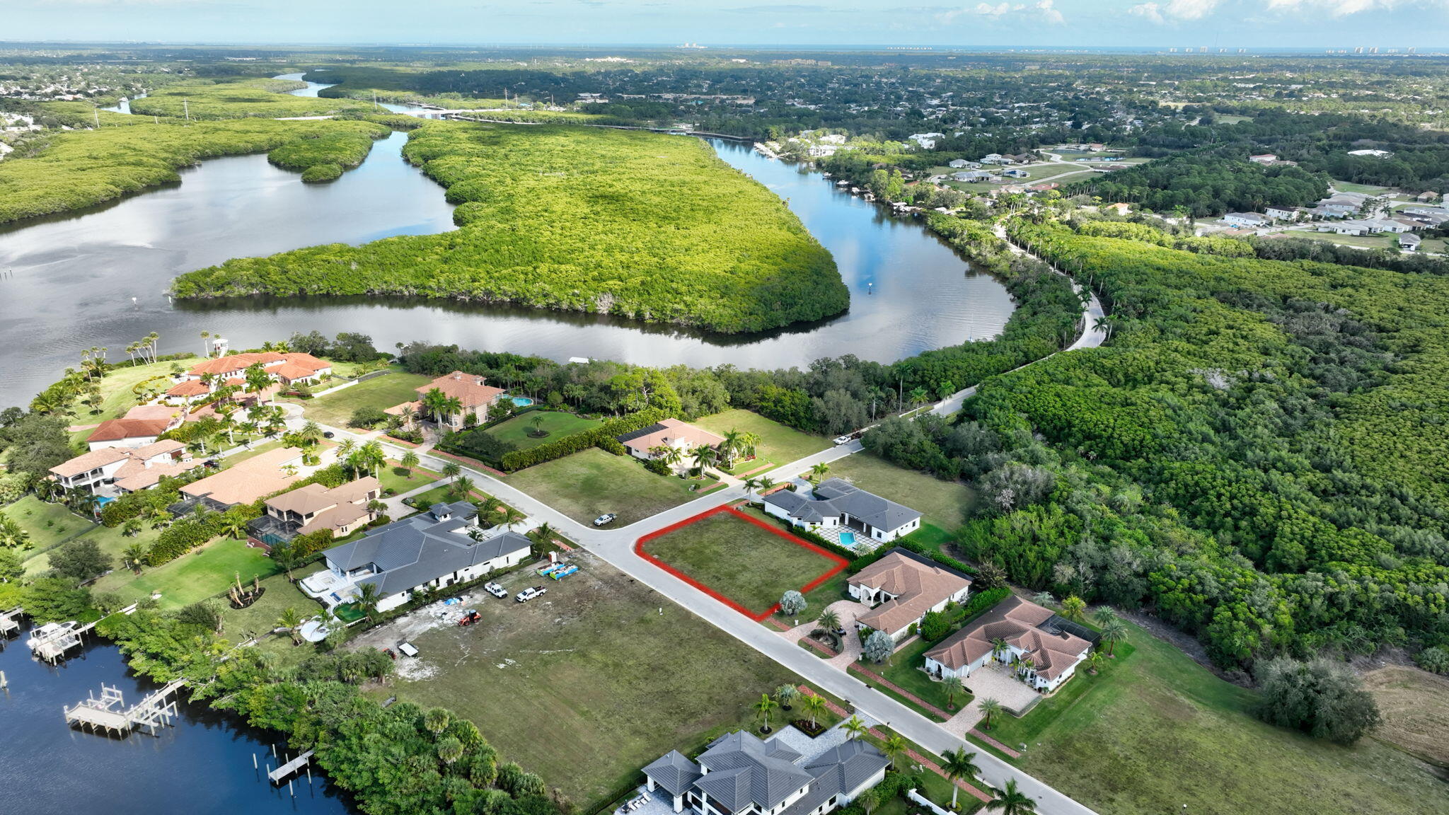 183 Southeast Via Terra Bella Port St. Lucie, FL 34952 - Photo 20 of 26 an aerial view of residential houses with outdoor space and swimming pool