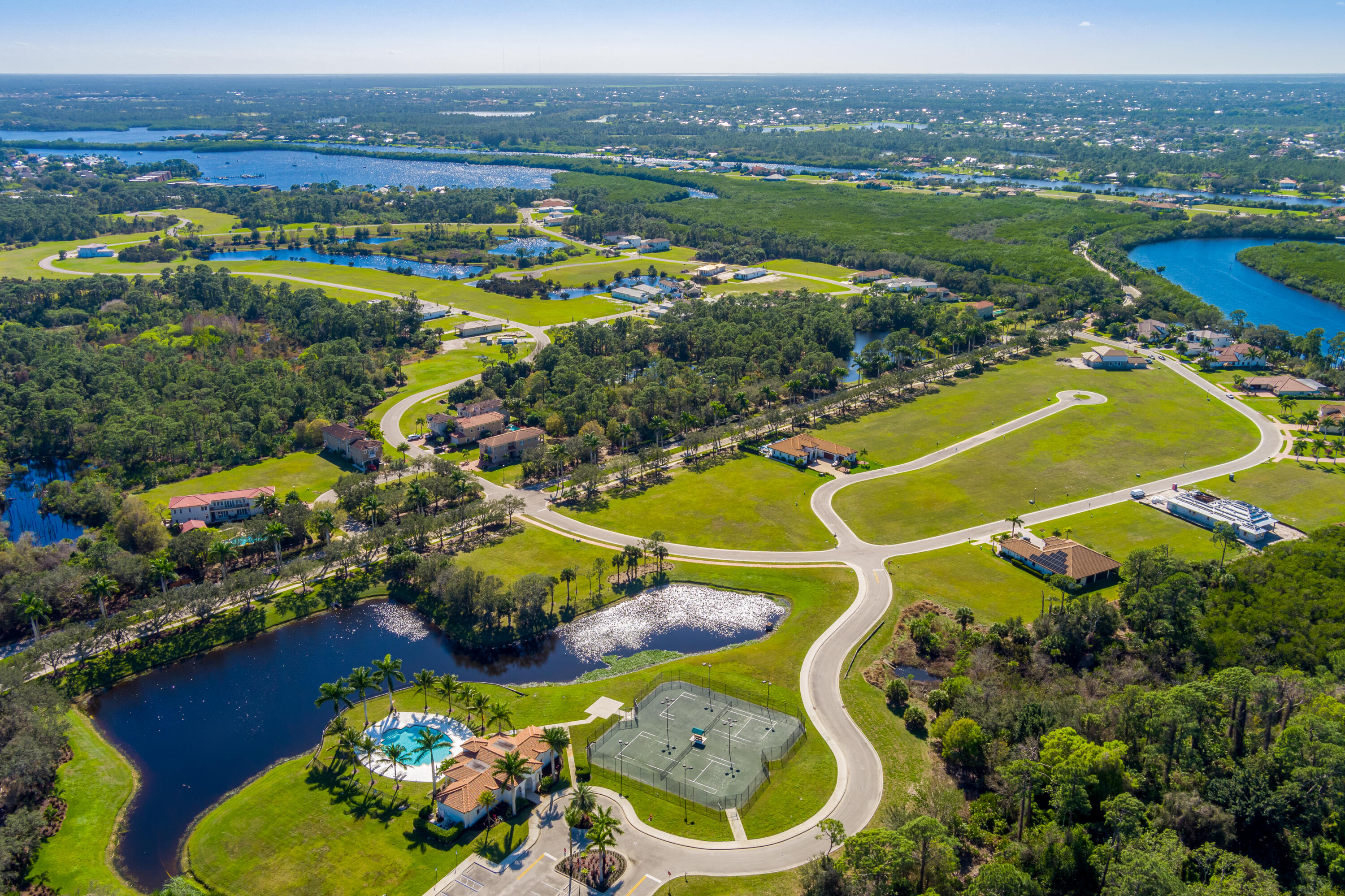 183 Southeast Via Terra Bella Port St. Lucie, FL 34952 - Photo 8 of 26 an aerial view of residential house with outdoor space swimming pool and ocean view