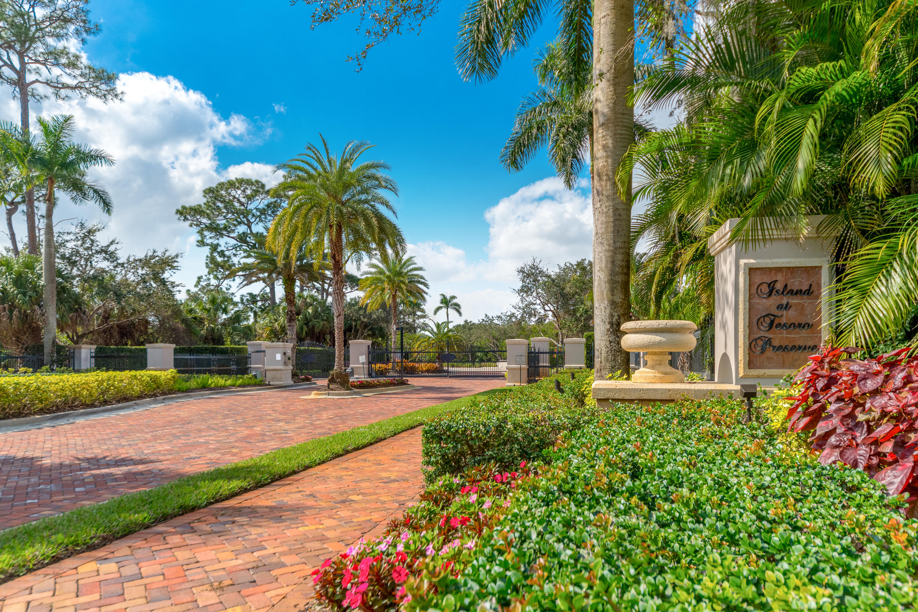183 Southeast Via Terra Bella Port St. Lucie, FL 34952 - Photo 9 of 26 a garden with palm trees