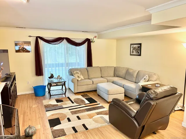 a living room with furniture and a couch