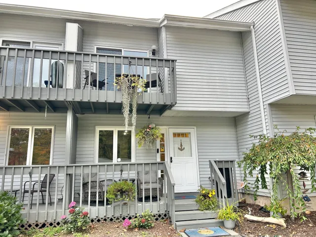 a front view of a building with balcony