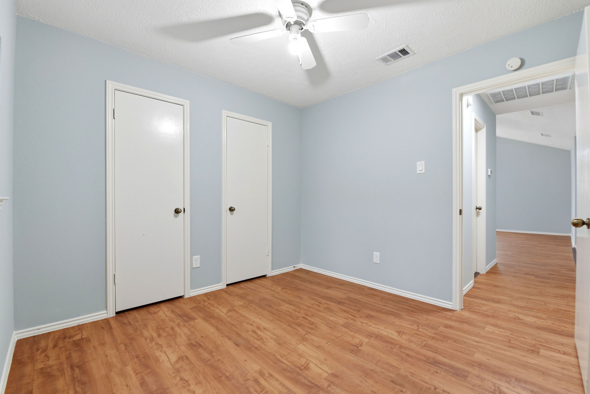 21330 Golden Dove Drive Spring, TX 77388 - Photo 19 of 29 Bedroom three offers great proportions, neutral paint, and easy access to the main hallway.