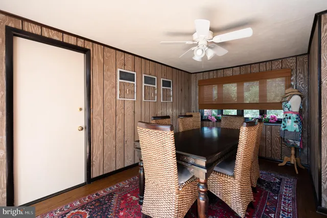 a view of a livingroom with furniture and window