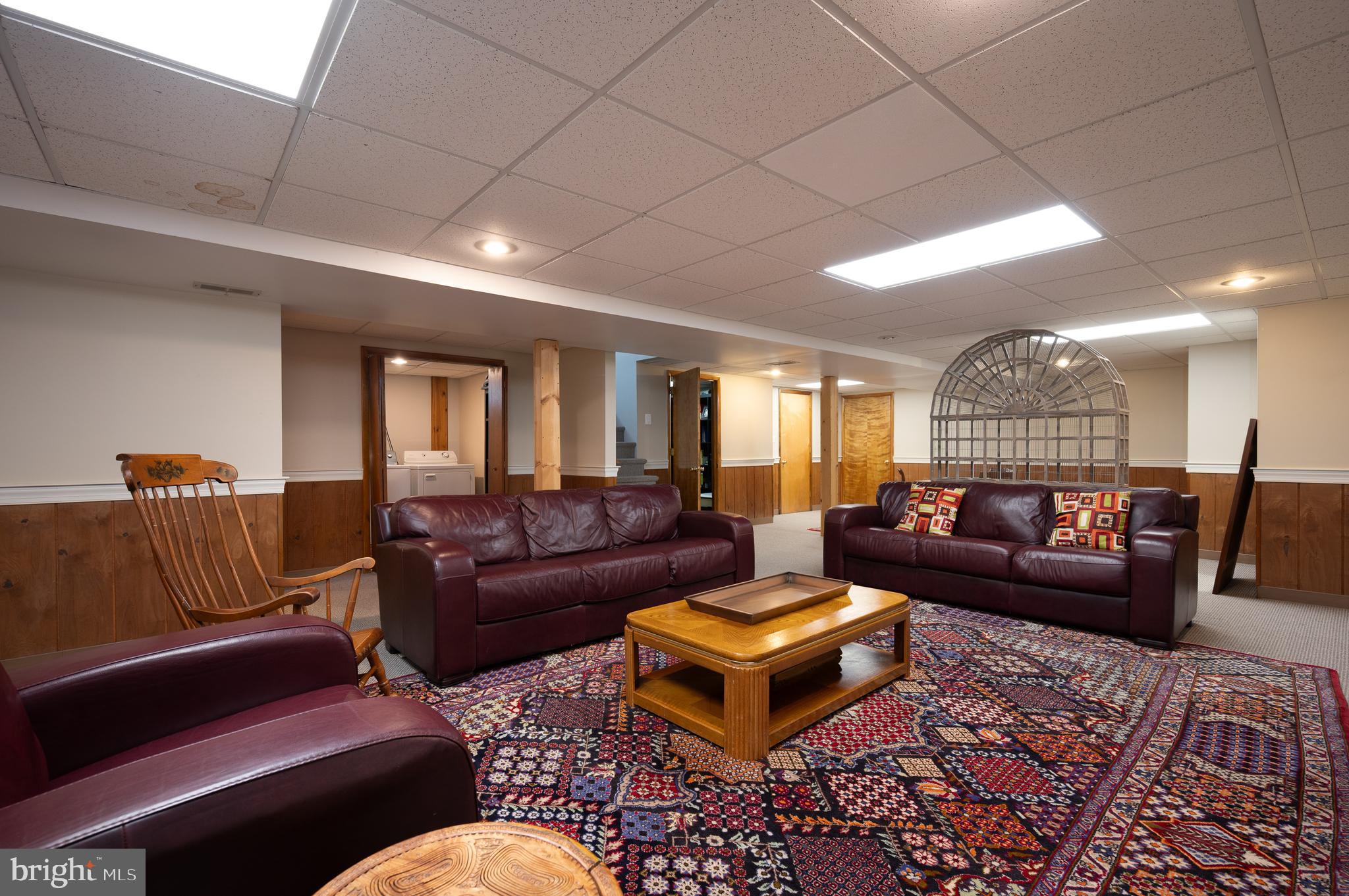1822 Foulk Road Wilmington, DE 19810 - Photo 18 of 32 a living room with furniture and a rug